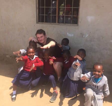 George Wall volunteering in Tanzania this summer.