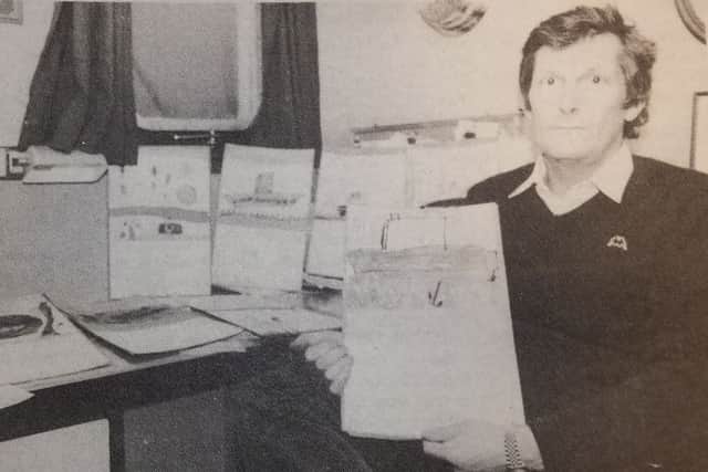 Captain Rademakers with the letters and paintings which lifted his spirits.