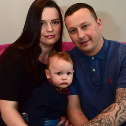 Neil Coulson and Joanne Evans with their son Parker (1) who have been cleared of a rape charge.