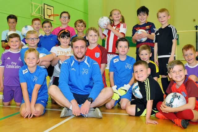 Greg Gavin with members of the Futsal session taking place in the gym at Hartlepool Sixth Form College. Picture by FRANK REID