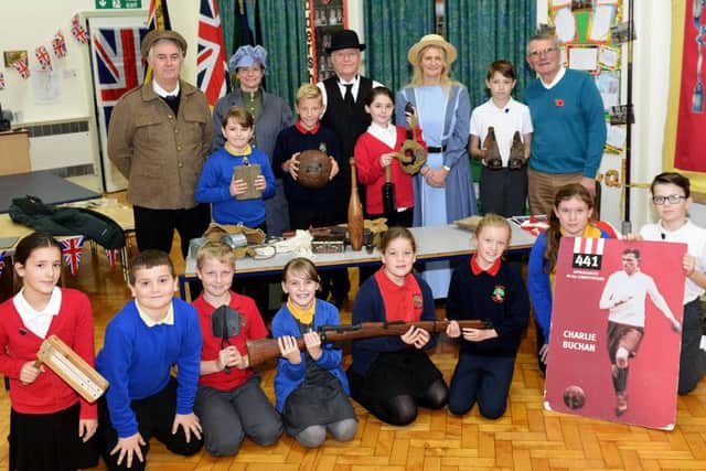 Pupils from Blackhall Primary Colliery, Hesleden Primary and St. Josephs Primary schools with members of the of the Blackhall History Group, during a Somme and remembrance day visit to Blackhall Colliery Primary School Picture by FRANK REID