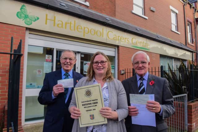 Karen Gibson, manager Hartlepool Carers, was presented with cheques at the Hartlepool Carers Centre, from John Bartram on behalf of Hartlepool Masonic Benevolent Association and Brian Footitt  of Durham Masonic Benevolent Association