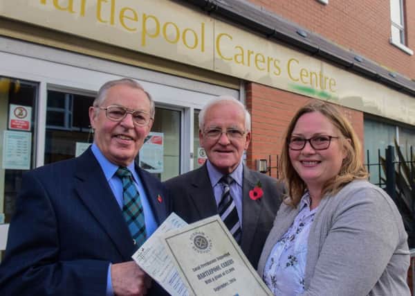 Karen Gibson, manager Hartlepool Carers, was presented with cheques at the Hartlepool Carers Centre, from John Bartram (left) on behalf of Hartlepool Masonic Benevolent Association and Brian Footitt (centre) of Durham Masonic Benevolent Association