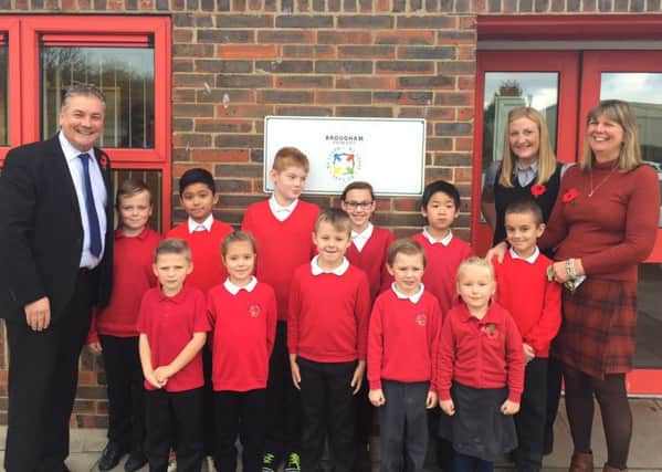 Brougham Primary School pupils with headteacher Julie Thomas (extreme right), deputy headteacher Sarah Greenan (second from right) and Andy Brown, chief executive officer of Ad Astra Academy.
