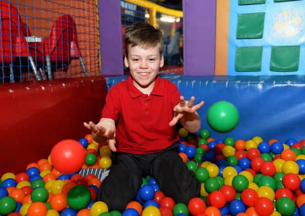Alfie Smith in the ball pool at Mr Twisters.