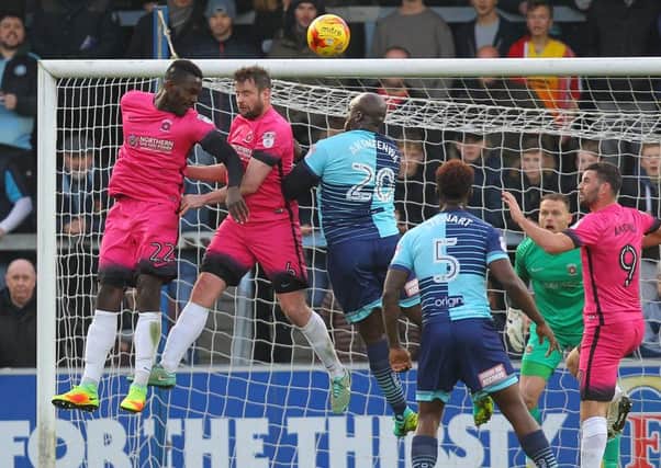 Pools' Toto Nsiala clears a dangerous cross at Wycombe on Saturday