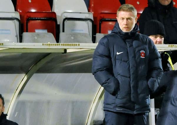 Craig Hignett watches his side overcome Accrington Stanley on Tuesday. Picture by Frank Reid