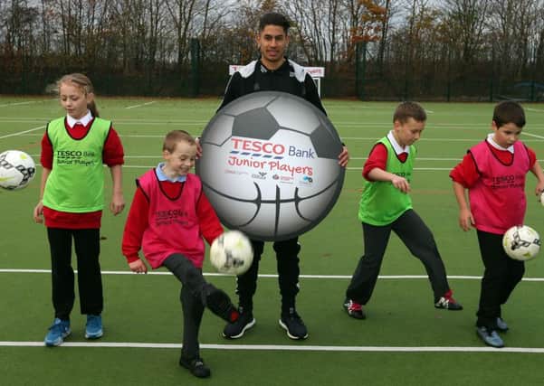 Ayoze Perez joins youngsters at the launch of the Tesco Bank Junior Players community programme