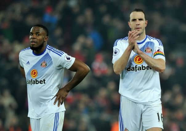 John O'Shea and Victor Anichebe at Anfield