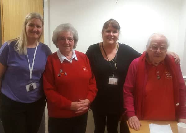 At the Queens Meadow care home event, from left, are manager Julie Armstrong, RNLI volunteer Ann Ray, activities co-ordinator Debbie Wilkes and RNLI volunteer Enid Birley.
