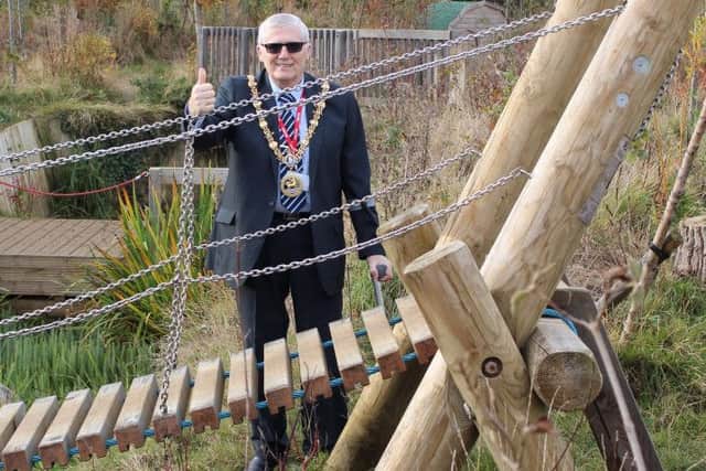 Photo captions: Hartlepool Mayor Councillor Rob Cook meets children at the Forest School project at Rossmere Primary School.