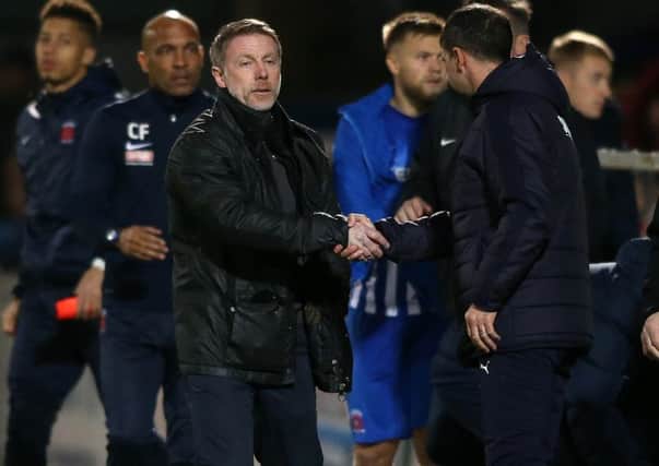 Craig Hignett shakes hands at the end of Sarturday's defeat