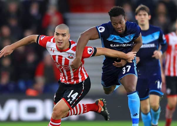 Southampton's Oriol Romeu (left) and Middlesbrough's Adama Traore battle for the ball