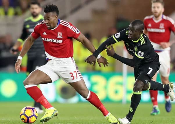 Middlesbroughs Adama Traore (left) and Chelseas NGolo Kante battle for the ball.