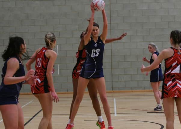 Oaksway netball team (blue) v Worcester Reds (red) at Brierton Sports Centre, Hartlepool, on Sunday.