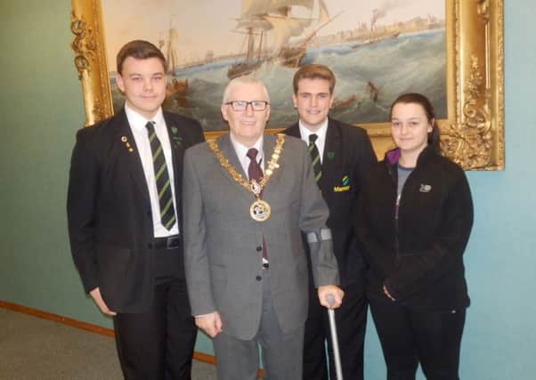 From left: Callum Reed, Daniel Measor and Chloe Vickers with Councillor Rob Cook following their Takeover Challenge visit to London.