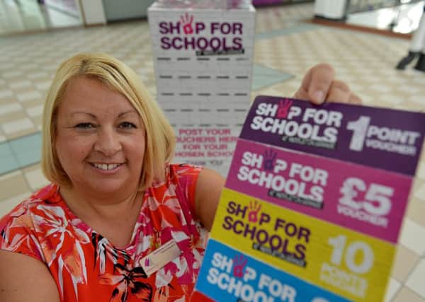 Middleton Grange Shopping Centre retail executive Suzanne Chaney with vouchers during the launch of the 2016 Shop For Schools event. Picture by FRANK REID