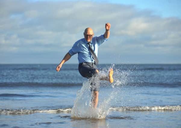 Hartlepool Roundtable chairman Mark Rycraft makes a splash to launch the annual Boxing Day Dip.
