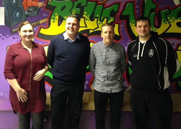 James Pallister, third left, with members of the community project.