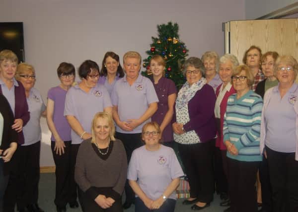 Pansies ladies meet the hospice team.