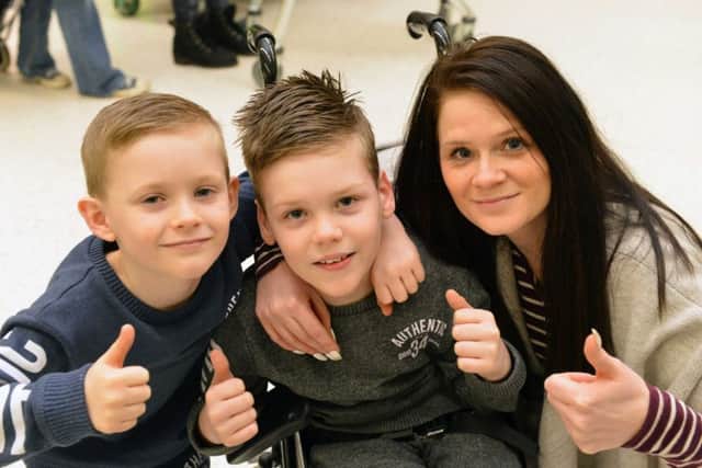 Alfie Smith with younger brother Alex Smith and mother Annie Stalley