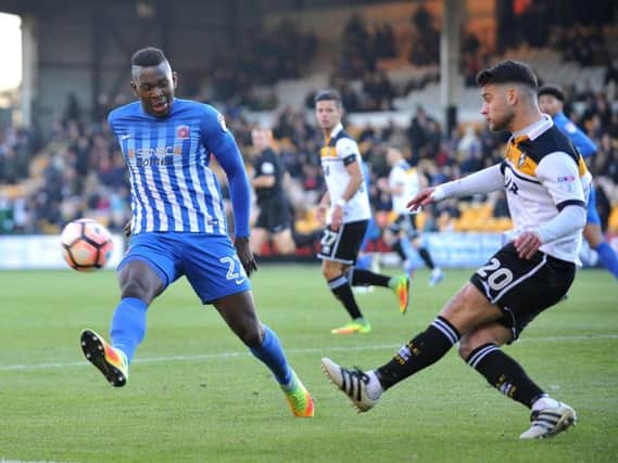 Toto Nsiala (left) in action for Pools in the FA Cup at Port Vale. Picture by FRANK REID