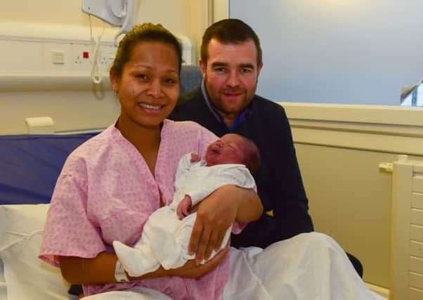 Martin and Sarah Nixon of Hartlepool with their New Year's Day baby son John at North Tees Hospital.