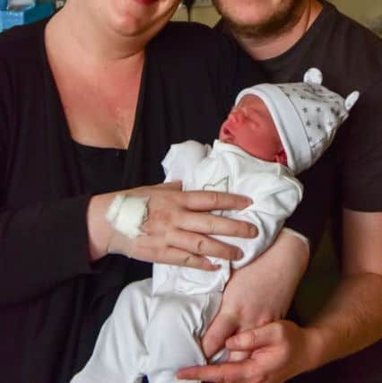 Richard and Angela Doidge of Trimdon Village with their New Year's Day baby son Oscar, at North Tees Hospital.
