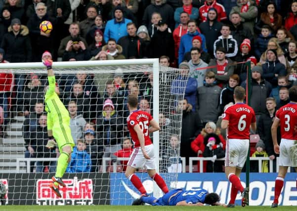 Middlesbrough goalkeeper Brad Guzan saves a late header from Leicester City's Leonardo Ulloa.
