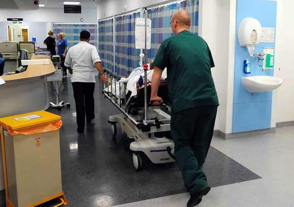 Accident and Emergency (A&E) staff dealing with patient