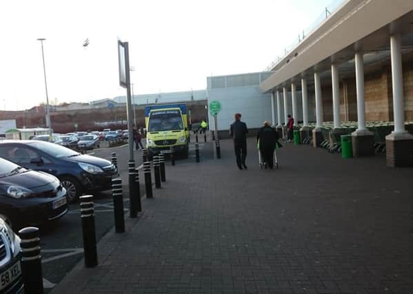 The ambulance outside Asda in Hartlepool after the call was made almost three hours earlier.