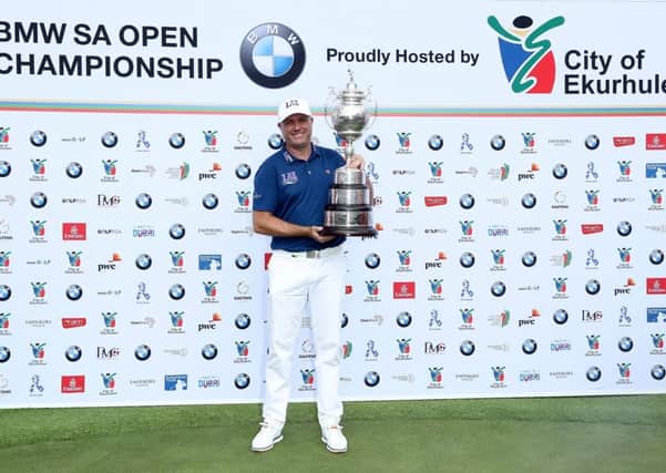 Graeme Storm poses with the trophy after his play-off win in the final round of the 2017 BMW SA Open. Picture by David Cannon/Getty Images)/ European Tour