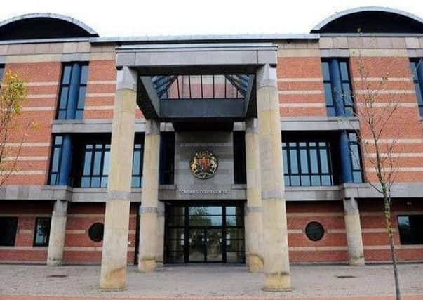 Teesside Crown Court heard the pair were caught with 23 large plants worth nearly Â£10,000.