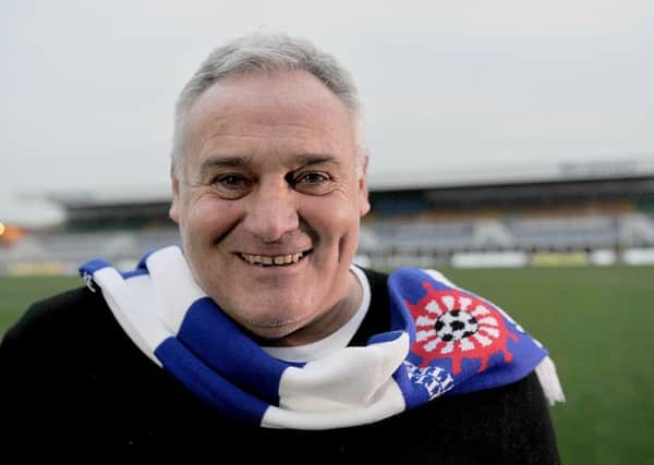 New boss Dave Jones is all smiles. Picture by FRANK REID