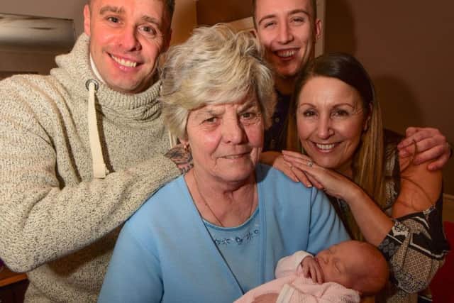 Maureen Stewart with 3-week-old Elsie Billyard, Maureens' daughter Shirley Blair, her son Paul Blair (left) and Dylan Billyard (2nd right)