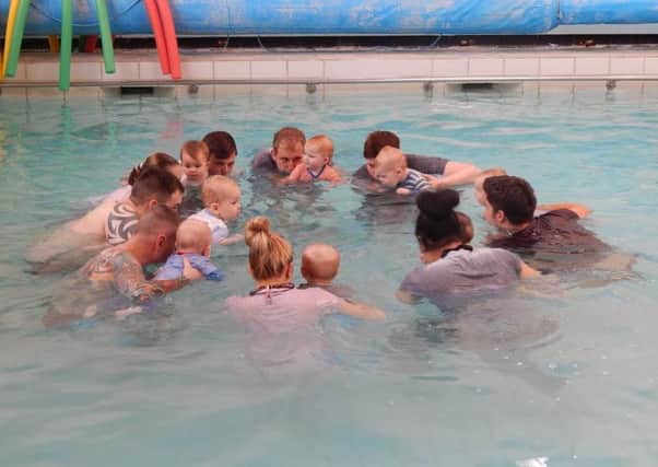 Little swimmers and their parents enjoying the fundraising week.