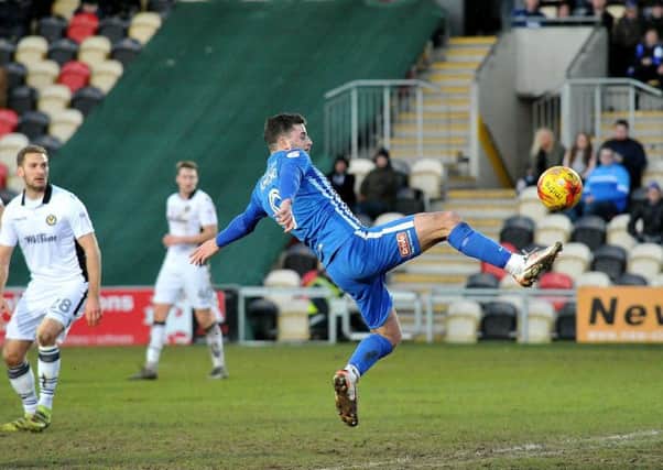 Padraig Amond stretches to score Pools' late goal