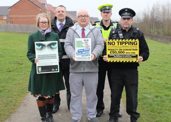 Councillor Paul Beck (centre) with Council and Police representatives at Bishop Cuthbert.