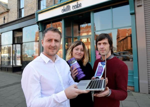 Jamie Arthur (left) from Blast Digital with Chili Cake owners Julie Evans and James Stoker. Picture by FRANK REID