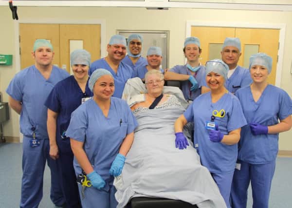 Jean Burton with the surgery team