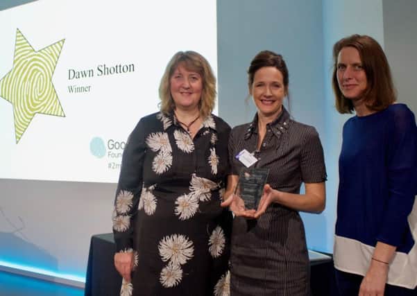 Dawn Shotton (Centre) receiving her award from Helen Milner, of the Good Things Foundation, and judge Katie ODonovan from Google.