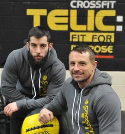 Crossfit Telic's Lee Howe, right, and Ash McFee.