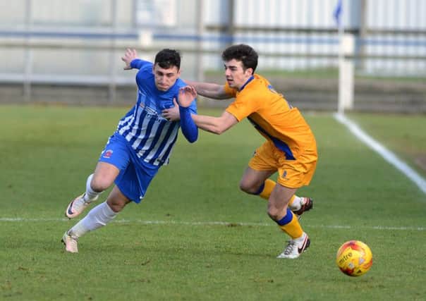 Nathan Thomas on the attack for Pools reserves against Mansfield. Picture by STU NORTON