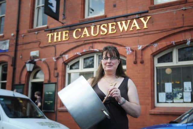 Thelma Adams pictured outside The Causeway pub.