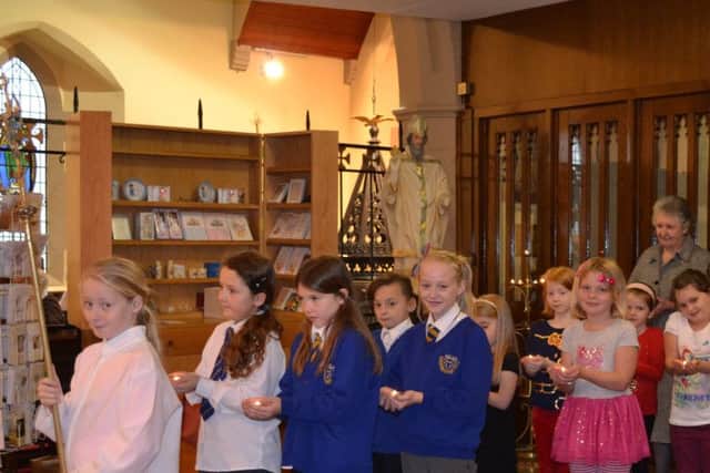 St Bega's pupils get ready at the back of church for the 2011 Youth Sunday celebration in St Mary's Church of The Immaculate Conception, Headland, Hartlepool.