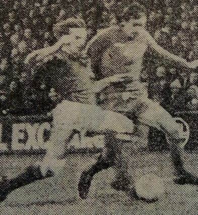 Malcolm Poskett attacks the Ipswich defence.
