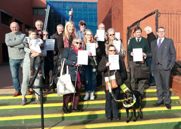 Seaton residents and supporters of the parking petition on the steps of Hartlepool Civic Centre