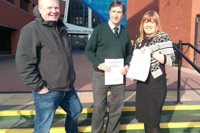 From left: Seaton Councillors Paul Thompson and Tom Hind hand over the petition to Denise Ogden, Director of Regeneration and Neighbourhoods at Hartlepool Borough Council