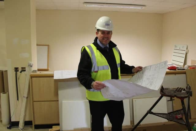 On site keeping work on progress: The trusts design and development manager Glen Newby.