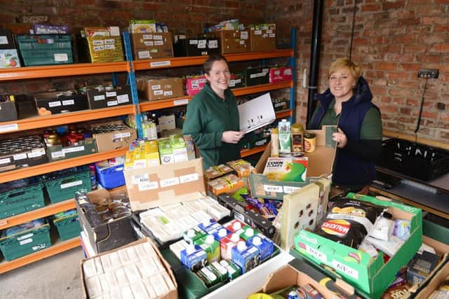 Foodbank coordinator Abi Knowles (left) with warehouse coordinator Lisa Lavender in the Hartlepool Foodbank food storage area. Picture by FRANK REID